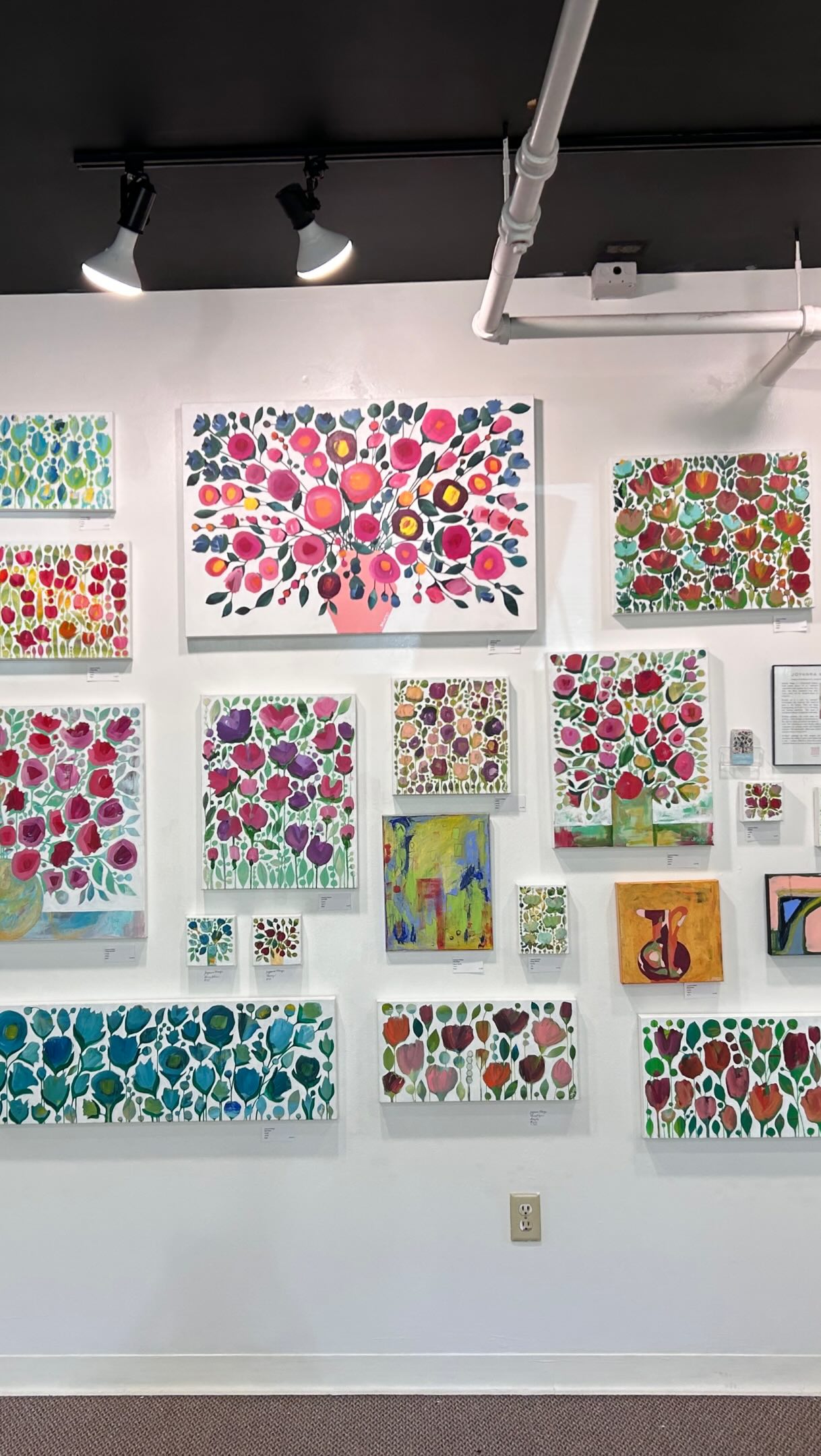 My new wall at @maineartcollective 🖼️ A couple times a year we switch spaces to freshen things up. It looks like a new gallery each time!  I brought a bunch of new work. Stop by to check it out - we’re open every day 10-6, at 157 Middle Street in #portlandmaine #artgallery #workingartist #maine #flowerart